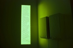 Text on wall and speakers